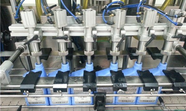 6 ہیڈ خودکار انجن آئل بھرنے والی مشین۔